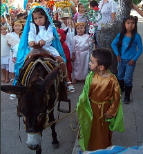 Children leading a posada in Mexico